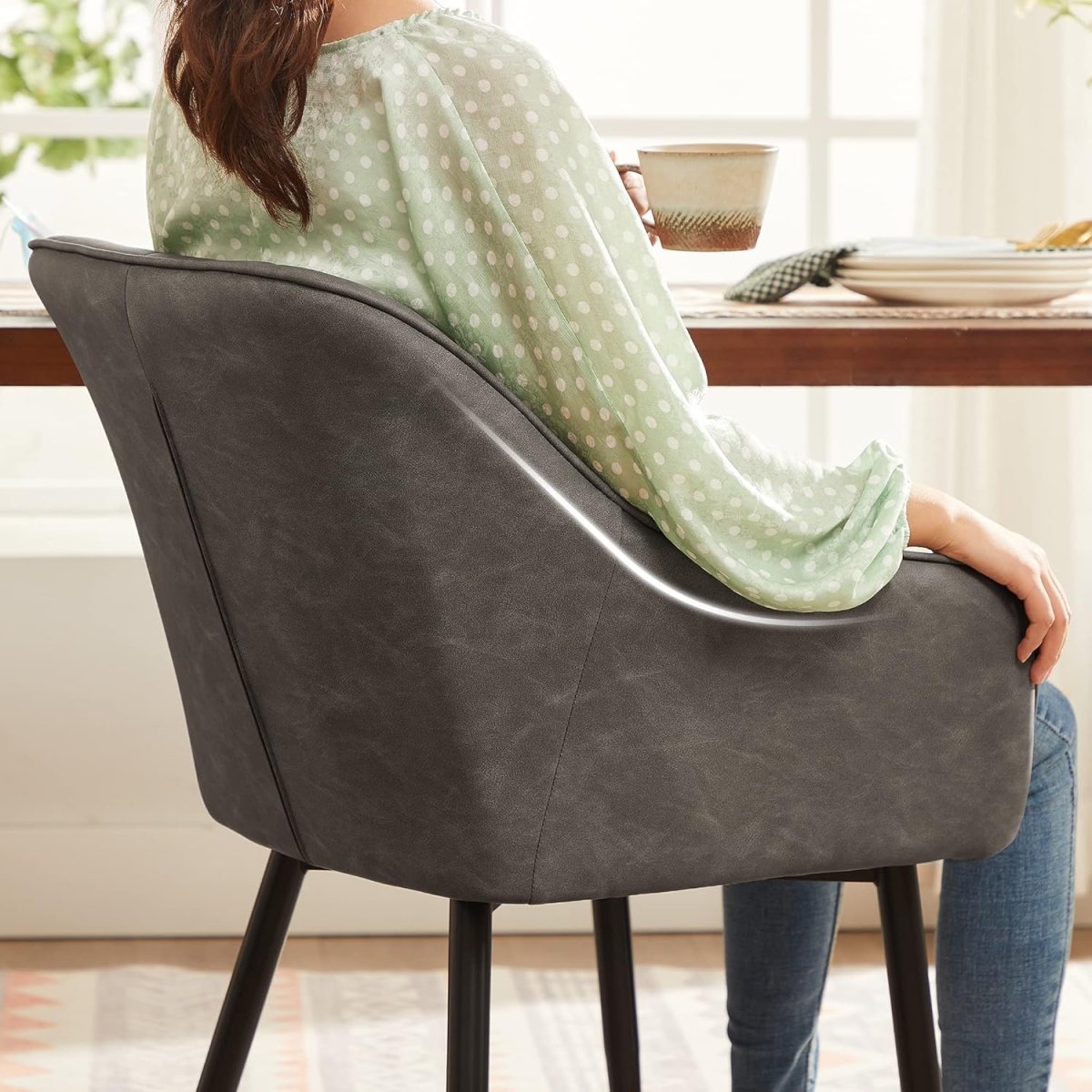 Comfortabele eetkamerstoel met armleuning - Modern design - De Vries Meubels