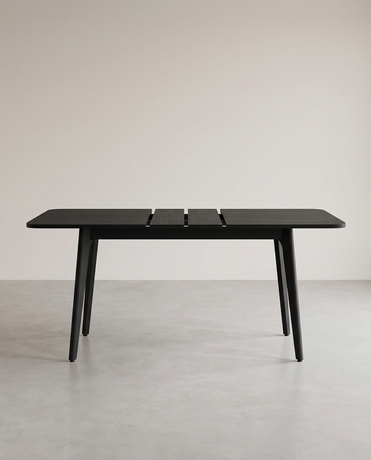 Uitschuifbare eettafel in zwart, 140 tot 180 cm